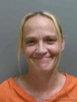 Mugshot of Julie Ann Olson booked in Lee County, Iowa on August 27, 2026