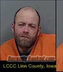 Booking photo from Linn County, Iowa