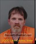 Booking photo from Linn County, Iowa