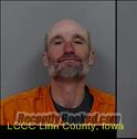 Booking photo from Linn County, Iowa