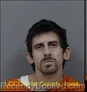 Booking photo from Linn County, Iowa