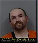 Booking photo from Linn County, Iowa