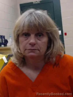 Mugshot of JEWELL DELILA VOGT booked in Louisa County, Iowa on April 3, 2026