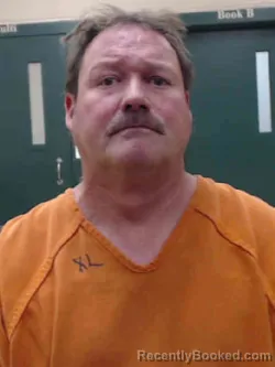 Mugshot of BRAD LEE HAZELWOOD booked in Louisa County, Iowa on April 9, 2026