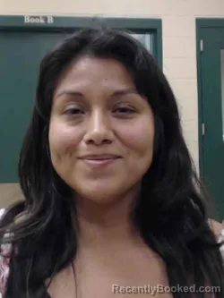 Mugshot of YAHDIDAH JIMENEZ booked in Louisa County, Iowa on April 2, 2026