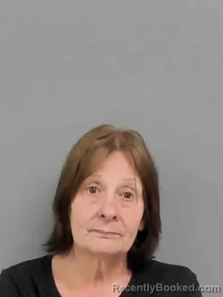 Mugshot of DANISE RENEE SLAGTER booked in Marion County, Iowa on May 14, 2026