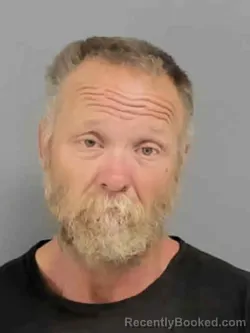 Mugshot of KENNETH WAYNE CHENET booked in Marion County, Iowa on March 29, 2026