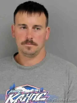 Mugshot of Daniel Bruce Caron booked in Marion County, Iowa on August 16, 2026