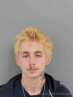 Mugshot of AUGUST JAMES CAWLEY booked in Marion County, Iowa on March 18, 2026