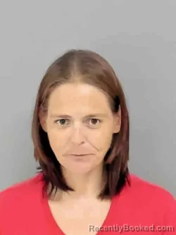 Mugshot of NICOLE LYNN MUNDY booked in Marion County, Iowa on August 3, 2026