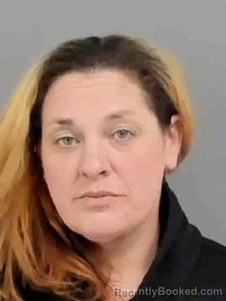 Mugshot of JESSICA LEA CORY booked in Marion County, Iowa on March 16, 2026