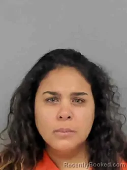 Mugshot of MELISSA ANN GARZA booked in Marion County, Iowa on March 19, 2026