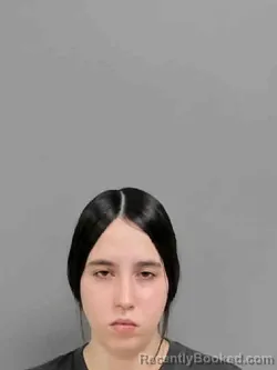 Mugshot of TRINTY SARAH EVANS booked in Marion County, Iowa on March 30, 2026