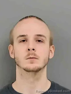 Mugshot of ROWAN HENRY PURCELL booked in Marion County, Iowa on March 31, 2026