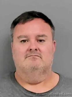 Mugshot of TODD ALAN DANIELS booked in Marion County, Iowa on March 31, 2026