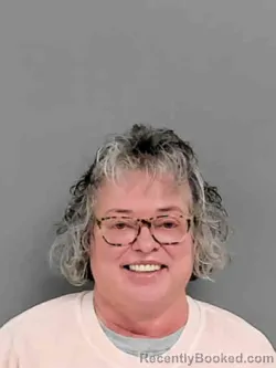 Mugshot of JENNIFER LYNN NEWTON booked in Marion County, Iowa on April 2, 2026