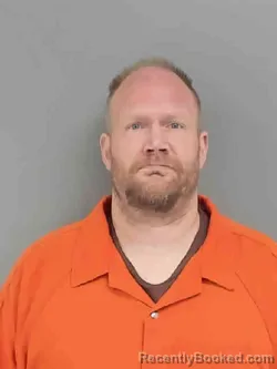 Mugshot of RAYMOND FRANK LEE booked in Marion County, Iowa on April 8, 2026