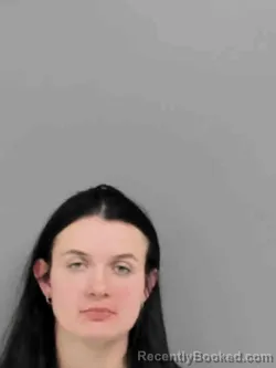 Mugshot of EMMA CAROLINE SCHNOEBELEN booked in Marion County, Iowa on April 9, 2026