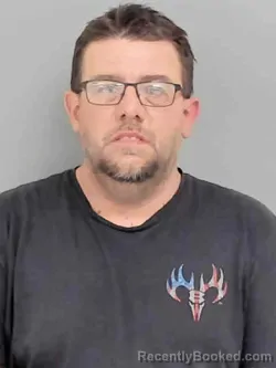 Mugshot of MICHAEL THOMAS BROSAM booked in Marion County, Iowa on May 22, 2026