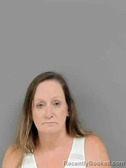 Mugshot of KARIN KAY LEACH booked in Marion County, Iowa on July 21, 2026