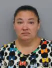 Mugshot of BRANDI LYNN KUTZNER booked in Marshall County, Iowa on July 29, 2026