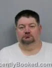Mugshot of DAMON WESLEY POWERS booked in Marshall County, Iowa on May 8, 2026