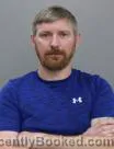 Mugshot of ERIC JAMES WOODBECK booked in Marshall County, Iowa on June 3, 2026