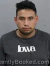Mugshot of Israel Lucas Santos booked in Marshall County, Iowa on October 6, 2026