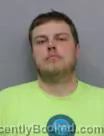 Mugshot of JUSTIN LANCE BORMANN booked in Marshall County, Iowa on May 1, 2026