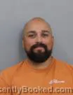 Mugshot of Moises David Chavez booked in Marshall County, Iowa on August 27, 2026