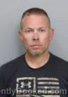 Mugshot of MICHAEL LEE COLLINS booked in Marshall County, Iowa on May 12, 2026