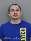 Mugshot of MITCHELL FLOTA RUIZ booked in Marshall County, Iowa on June 14, 2026