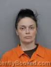Mugshot of MICHELE LYNETTE SCOFIELD booked in Marshall County, Iowa on August 4, 2026