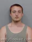Mugshot of TYLER THEODORE JOHN HARMS booked in Marshall County, Iowa on June 17, 2026