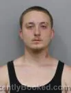Mugshot of Tyler Theodore John Harms booked in Marshall County, Iowa on July 29, 2026