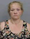 Mugshot of TINA MARIE WEBER booked in Marshall County, Iowa on May 27, 2026