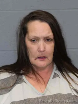 Mugshot of SHERRY LYNN HARVEY booked in MIlls County, Iowa on April 22, 2026