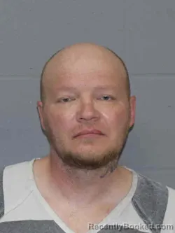 Mugshot of DUSTIN LEE MATTOX booked in MIlls County, Iowa on April 23, 2026