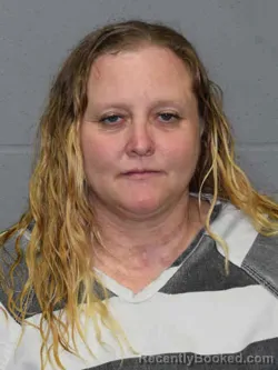 Mugshot of REBECCA LEE MENDOZA booked in MIlls County, Iowa on May 20, 2026