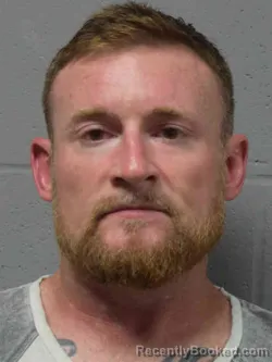 Mugshot of Travis Nelson booked in MIlls County, Iowa on August 20, 2026