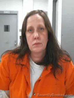 Mugshot of KIM ELAINE HAURY booked in Muscatine County, Iowa on April 27, 2026