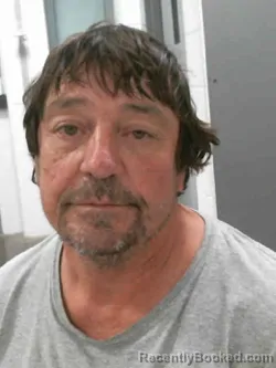 Booking photo from Muscatine County, Iowa