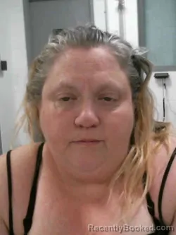 Mugshot of CHERYL LYNN GEORGE booked in Muscatine County, Iowa on May 11, 2026