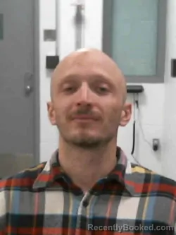 Booking photo from Muscatine County, Iowa