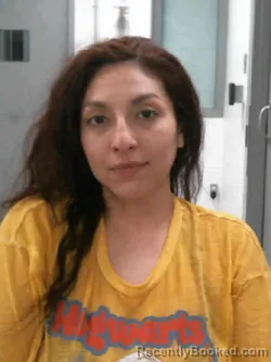 Mugshot of DAROLYN JAEL LANUZA booked in Muscatine County, Iowa on April 2, 2026