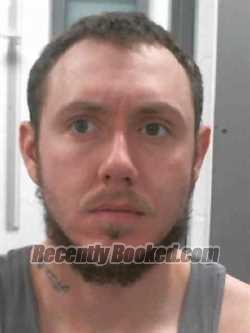Booking photo from Muscatine County, Iowa