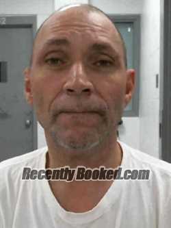 Booking photo from Muscatine County, Iowa