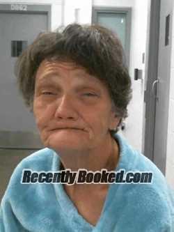 Mugshot of SUSAN MARIE CLARKE booked in Muscatine County, Iowa on April 27, 2026