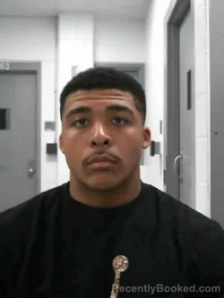 Mugshot of MAURICIO MARTELL REED