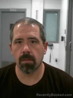 Booking photo from Muscatine County, Iowa